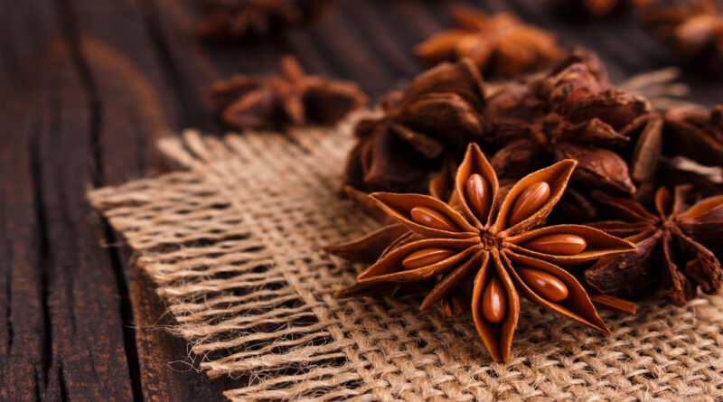 Anise,Stars,On,A,Dark,Rustic,Background